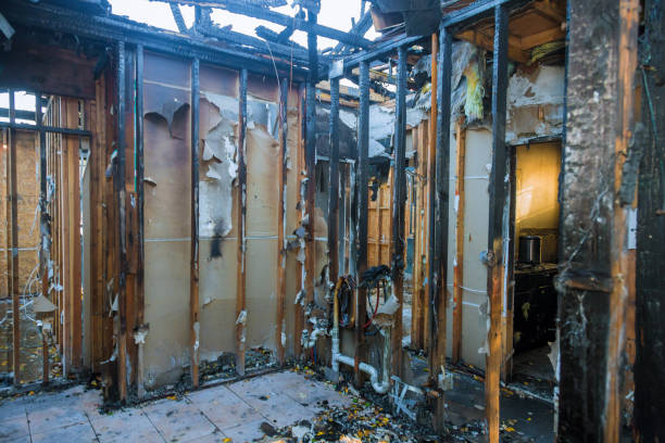 Professional Emergency Fire Damage Restoration technician working in Clementon, NJ